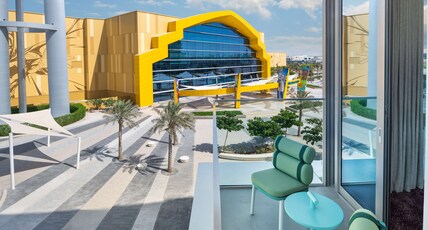 The WB Abu Dhabi, Curio Collection by Hilton - Free Theme Park Tickets Room Type - KING PRODUCERS SUITE