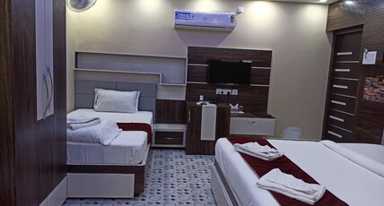 SANCHARI RESORT & RESTAURANT Room Type - DELUXE COTTAGE (TRIPPLE)