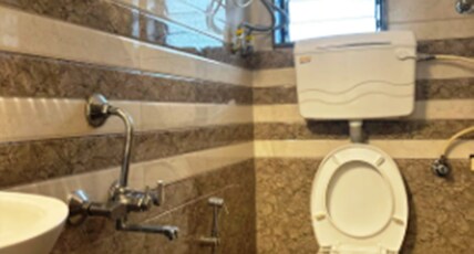 Cozy Rose Apartments off Carter Rd Bandra W Room Type - 1BHK Apartment
