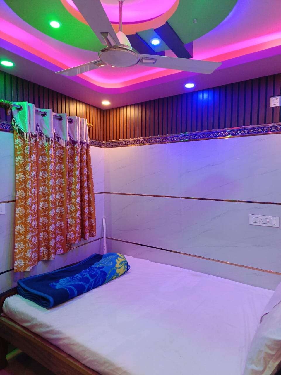 Rajmata Guest House - Tap to explore photos