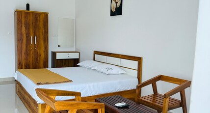 Hotel Cherkala City Centre Room Type - Deluxe Room