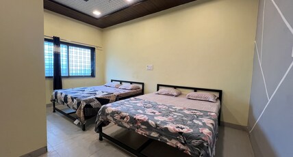 Hotel Indrayani Room Type - Standard Room with Hill View Queen Bed