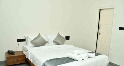 CHINTHU LEGACY Room Type - Deluxe Queen Bed Room