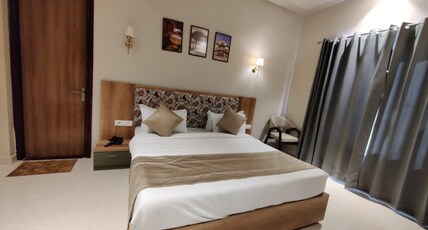 Infinity Hotels and Resorts Room Type - Balcony Suite Room with Garden View