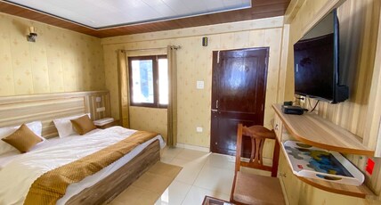 SNR Grand, Badrinath Room Type - Deluxe Room