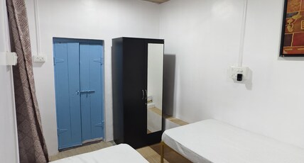 Varsha Residency Room Type - Bedroom 2