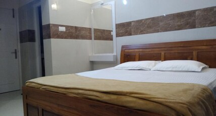 Kutralam Ezhilagam Hotel Room Type - Deluxe Studio Room With Balcony - MULLAI - (A\C)