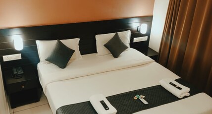 Ivy Residency Room Type - Deluxe Room AC