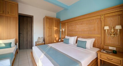 Evlogia Hotel Seafront and Annex by Greek Pride Room Type - ANNEX Standard Triple | Garden View Evlogia Hotel Seafront and Annex by Greek Pride Room Type - ANNEX Standard Triple | Garden View