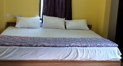 Radha Rani Hotel Room Type - Deluxe Room - AC