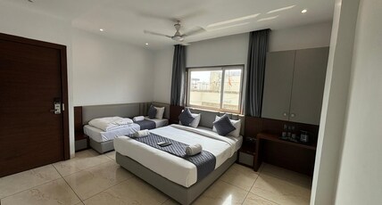 Hotel Rajdev Inn Room Type - Deluxe Triple Room
