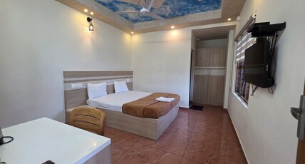 MIST RESIDENCY Room Type - Deluxe Double Room
