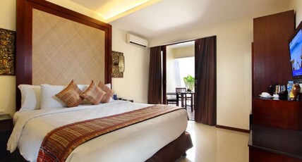Best Western Kuta Villa Room Type - 1 Queen Bed, Smoking Room, Deluxe Room, Flat Screen Television, Safe Deposit Box, Coffee Maker, Bath Best Western Kuta Villa Room Type - 1 Queen Bed, Smoking Room, Deluxe Room, Flat Screen Television, Safe Deposit Box, Coffee Maker, Bath