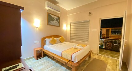 THE HOME RESIDENCY Room Type - Deluxe Balcony Room