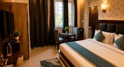 Hotel Kaanha Residency Inn by Shree Krishna Hospitality Room Type - Deluxe Room