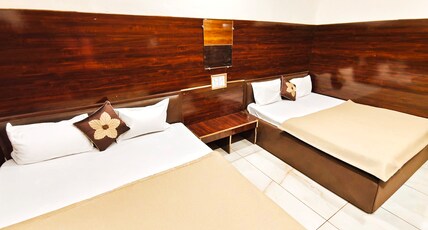 HOTEL OM PALACE Room Type - SUPERIOR FOUR BED