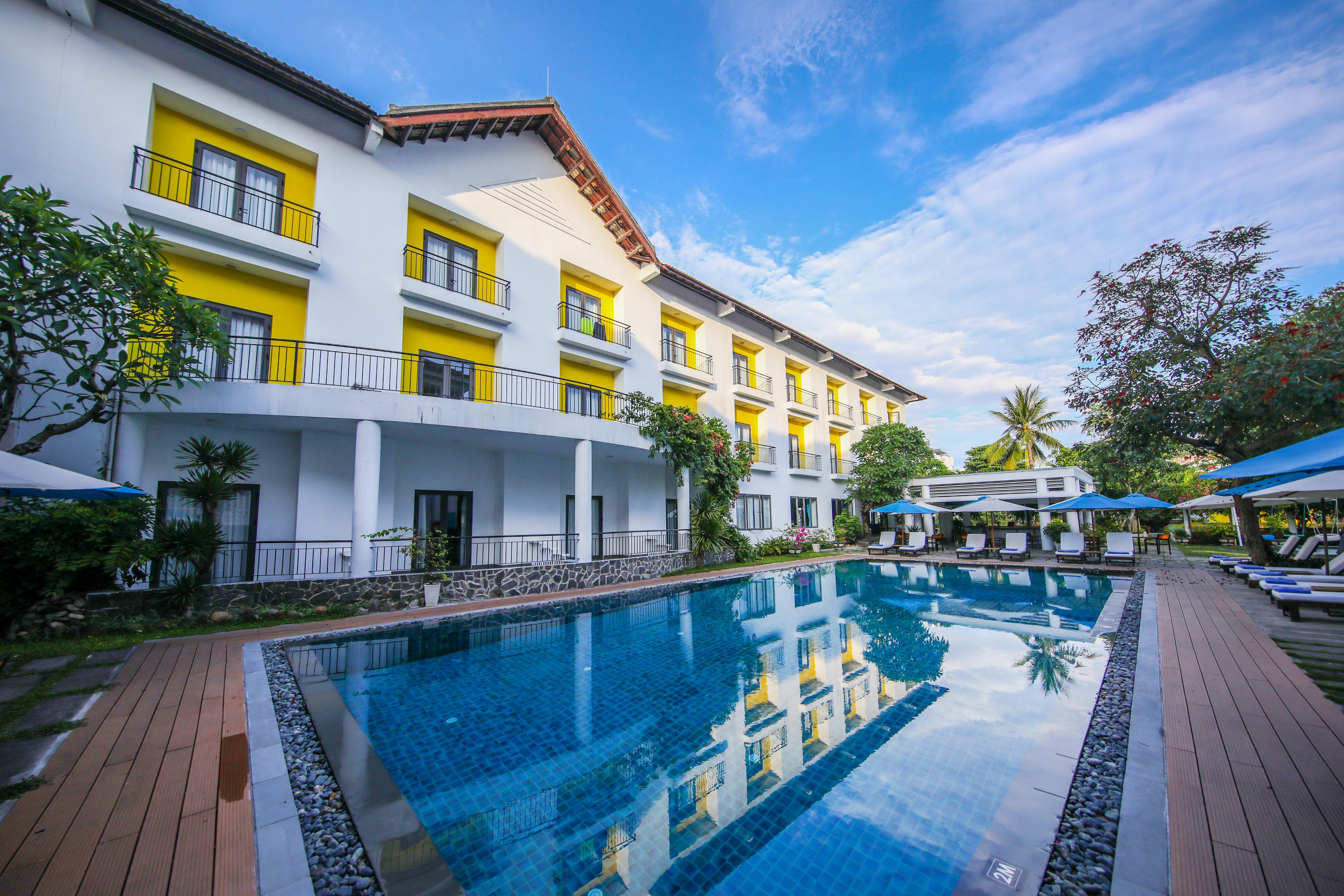 Emm Hotel Hoi An - Tap to explore photos