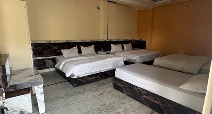 BHAGIRATHI RESIDENCY Room Type - Family Room 2 Double Bed