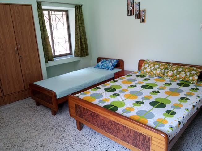 Olive Homestay- Triple Occupancy Room - Tap to explore photos