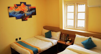 KUSUM PALACE PVT LTD Room Type - Triple Family Room