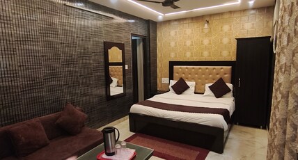 Hotel Gulmohar  Room Type - Deluxe triple bed room