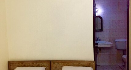 Shanti Guest House Room Type - Double Bed non AC with Private Bathroom