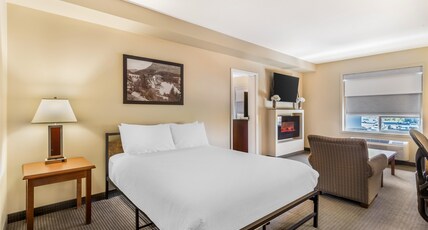Best Western Plus Service Inn & Suites Room Type - Suite-1 King 1 Queen, Non-Smoking, Separate Bedroom, Family Room, Sofabed, Microwave And Refrigerato Best Western Plus Service Inn & Suites Room Type - Suite-1 King 1 Queen, Non-Smoking, Separate Bedroom, Family Room, Sofabed, Microwave And Refrigerato