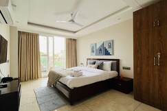 BluO 1BHK Suite - Balcony, Lift, Gym, Parking, TT