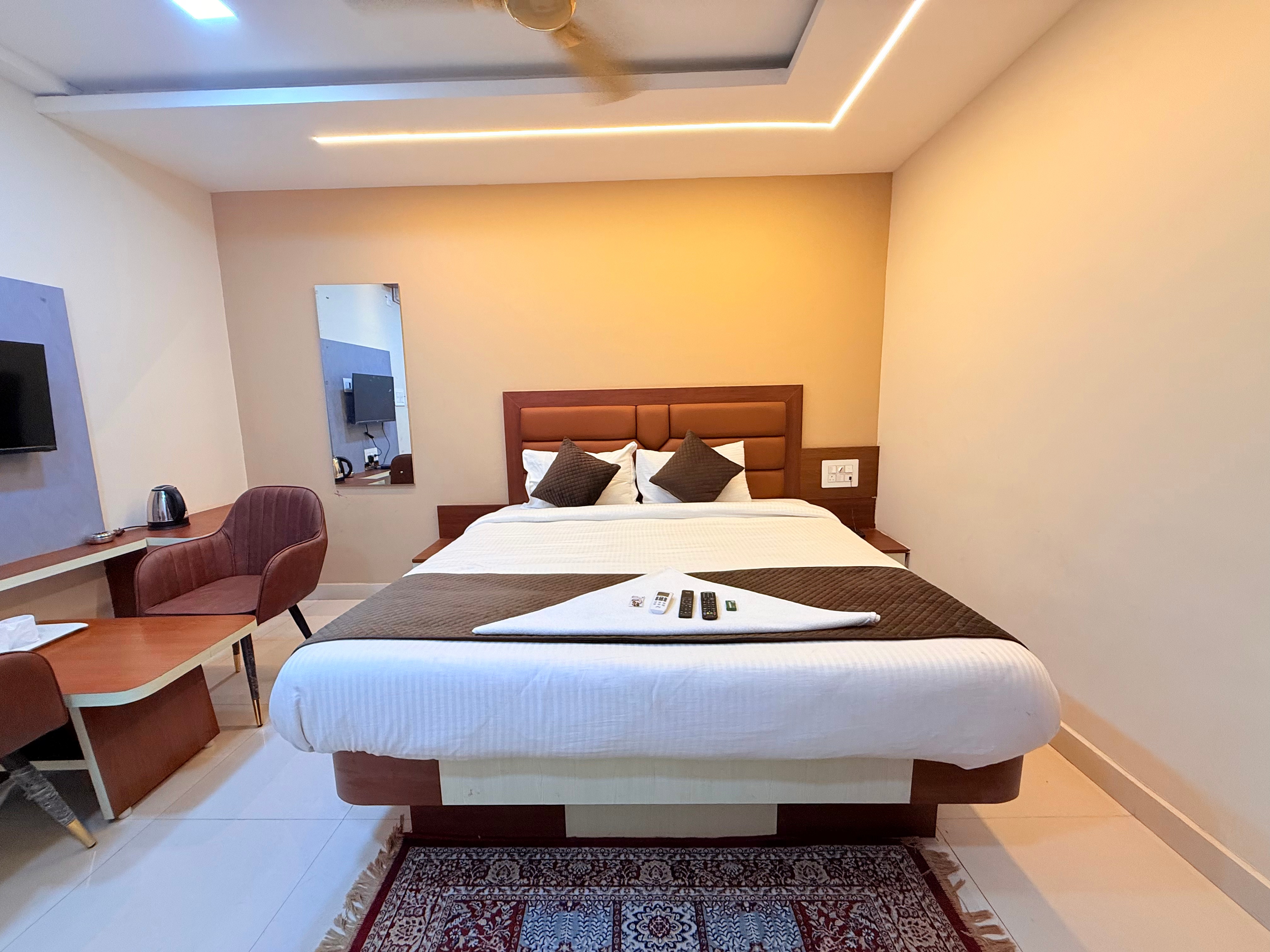 Hotel Suravi - Tap to explore photos