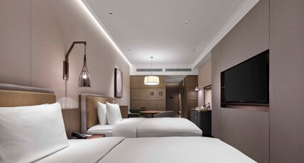 DoubleTree by Hilton Yantai Golden Coast Hotel & Suites Room Type - TWIN GUEST ROOM SEA VIEW