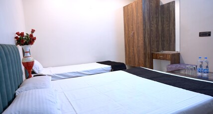 Om Hotel & Restaurant Room Type - Triple Bed Deluxe AC room