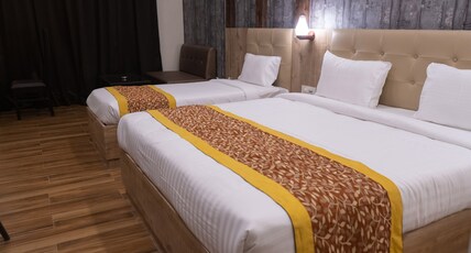 HOTEL THE GRAND RADHE SHYAM Room Type - SUPER DELUXE ROOM TWIN BED