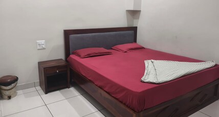 Karma Bai Hotel Palace and Restaurant Room Type - Deluxe Room with AC