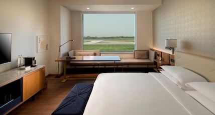 Andaz Delhi, by Hyatt Room Type - 1 King Bed with Runway Deluxe View Andaz Delhi, by Hyatt Room Type - 1 King Bed with Runway Deluxe View