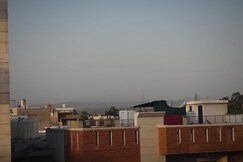 Om Homestay  
Hill View from top floor