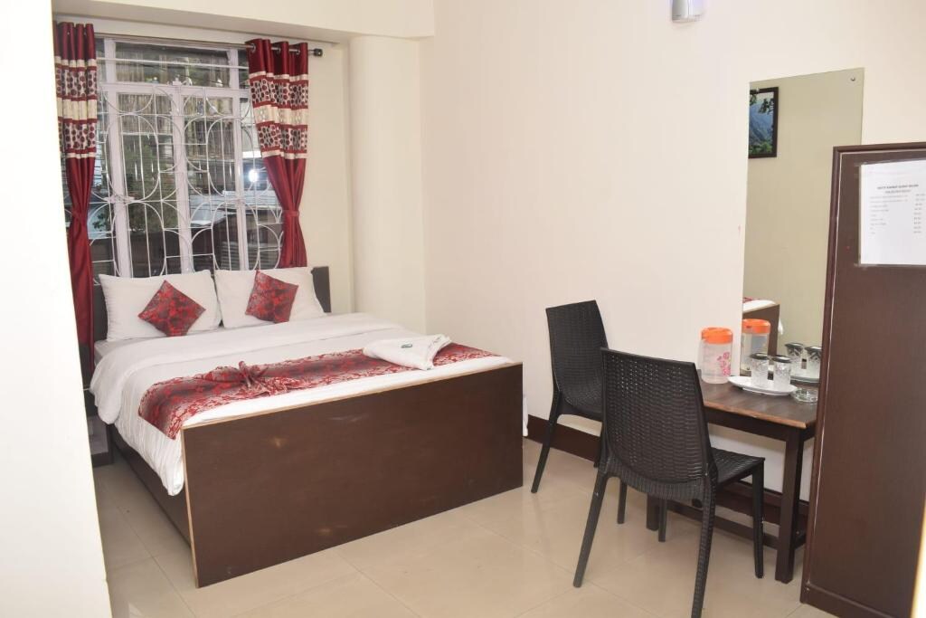 White Rabbit Guest House | City-view Rooms - Tap to explore photos