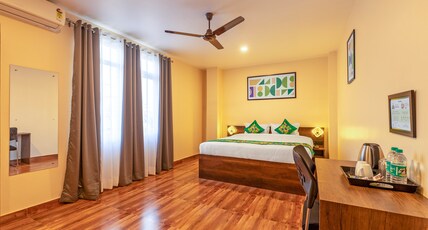Treebo Green Pearl Inn Room Type - Deluxe Room