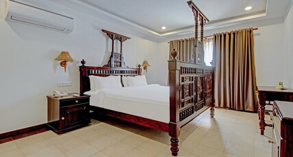Treebo Premium Travancore Palace Cherthala Room Type - Superior Room With City View
