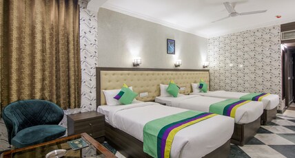 Treebo Trinetar International Room Type - Deluxe Room