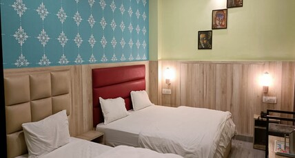 HOTEL NEEL GAGAN  HOTEL TOURIST Room Type - STANDARD TRIPLE BED AC ROOM