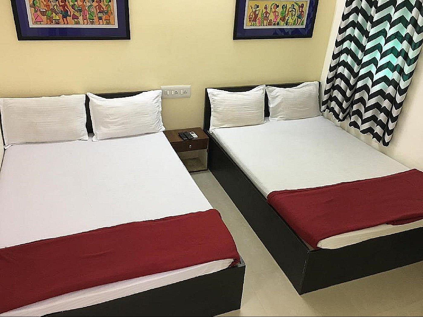 Srirangam Suite Rooms - Tap to explore photos