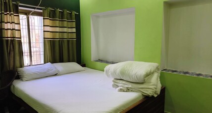 Maa Durga Inn | Near Kashi Vishwanath Temple Room Type - Deluxe AC Room | Attached Washroom