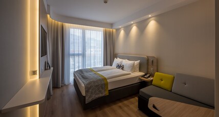 Holiday Inn Express Luzern - Kriens Room Type - 1 Queen Standard Single Sofa Bed with Free Breakfast Holiday Inn Express Luzern - Kriens Room Type - 1 Queen Standard Single Sofa Bed with Free Breakfast