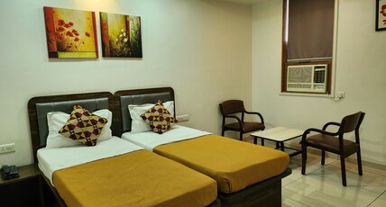 ATITHI INN Room Type - DELUXE AC TWIN BED