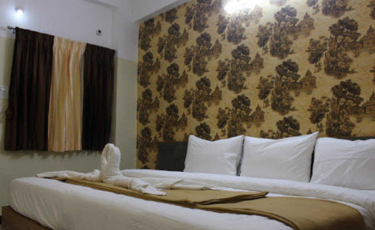 HOTEL SAMYUKTHA INN - Tap to explore photos