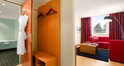 Ramada Encore by Wyndham Geneva Room Type - 1 King Bed Suite with Sofa Bed, Non-Smoking Ramada Encore by Wyndham Geneva Room Type - 1 King Bed Suite with Sofa Bed, Non-Smoking