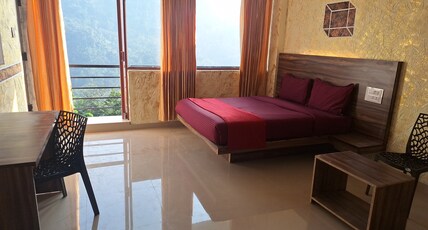 Rambler Garden Resort Room Type - Deluxe room NON AC  With balcony with mountain view.