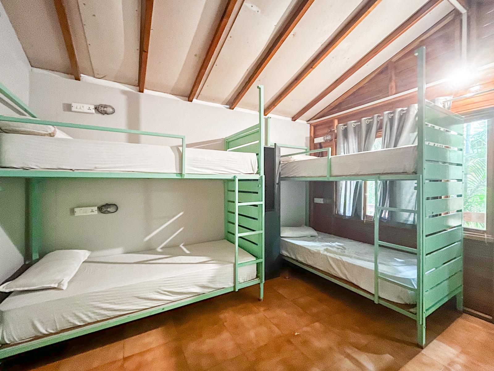 Overstay Hostel - Tap to explore photos