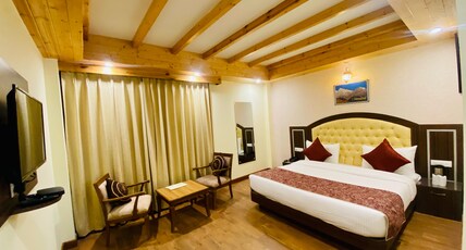 Snow Paradise - Pure Veg Hotel Room Type - Deluxe Room