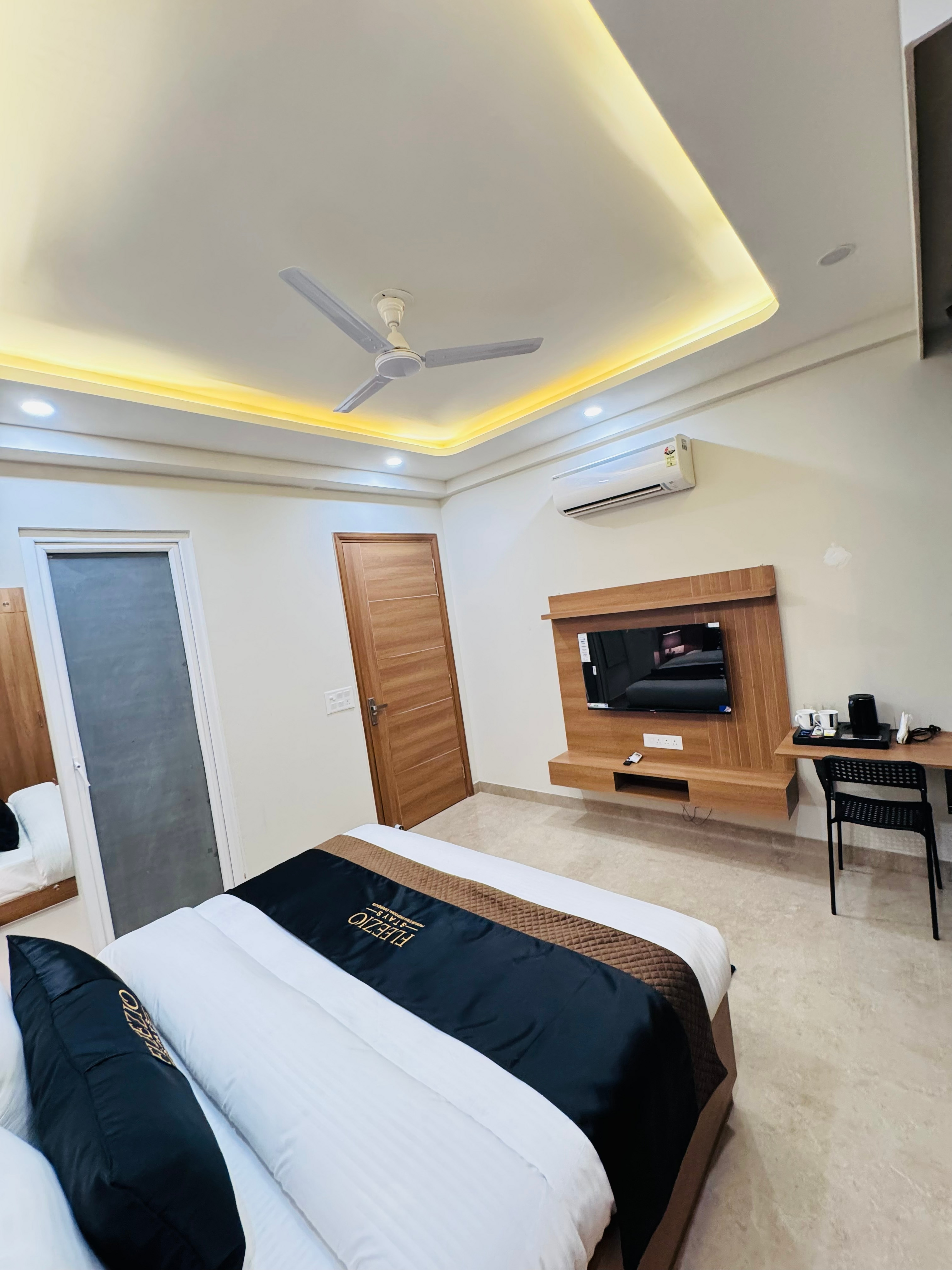 Fleezio Stays 42 2BHK - Tap to explore photos